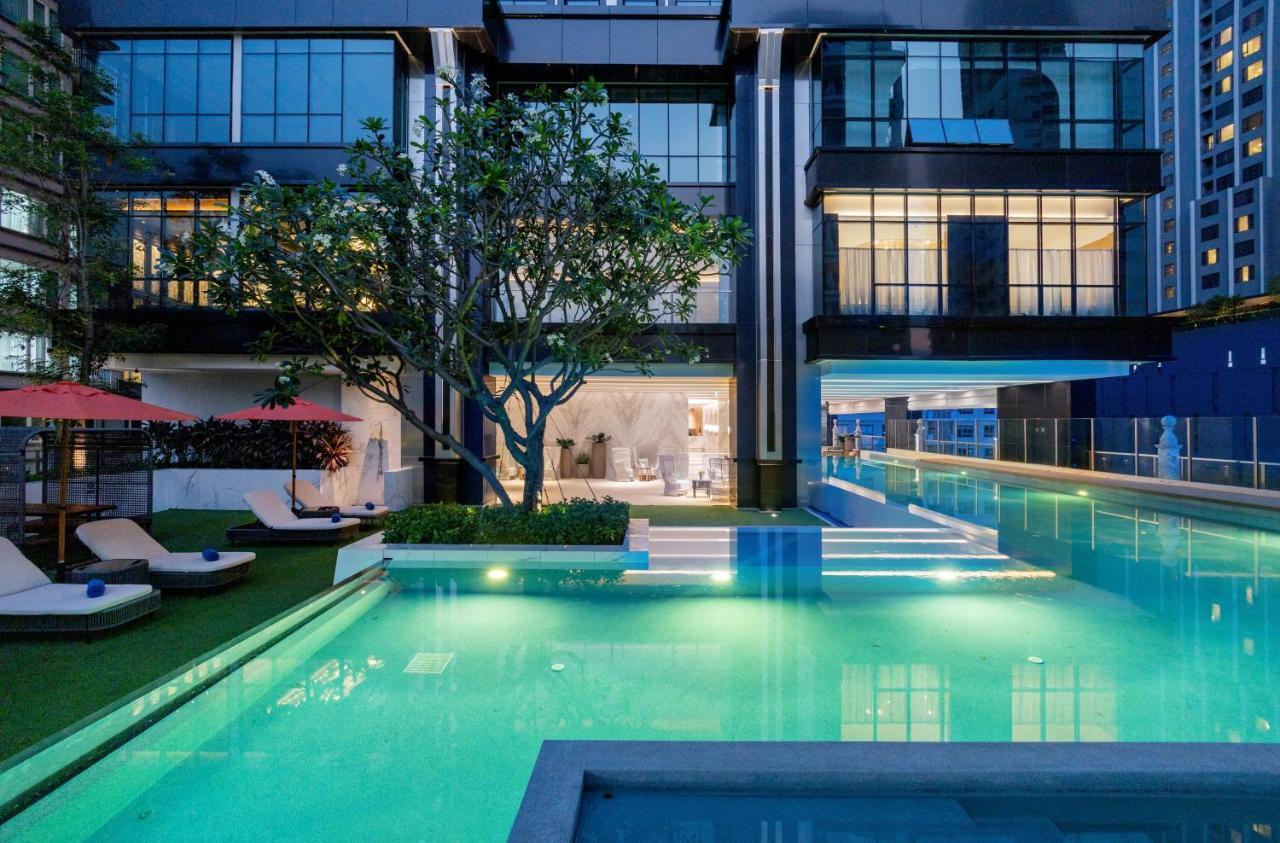 Silq Hotel & Residence, Managed By The Ascott Limited بانكوك المظهر الخارجي الصورة The swimming pool at the hotel
